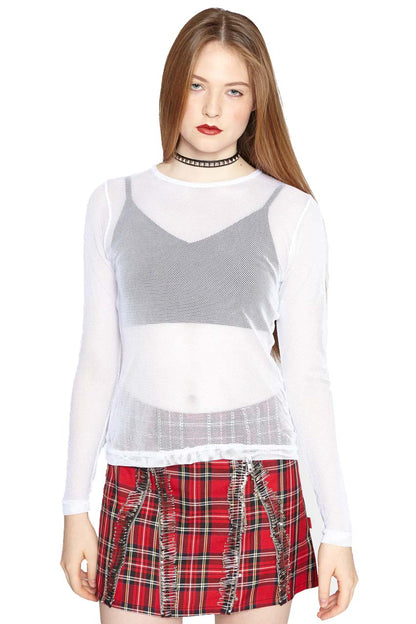 A model wearing the white Long Sleeve Baby Doll Fishnet Shirt with black bra and plaid skirt, front view.