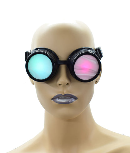 The Aurora Lights Blindfold on a mannequin head with green and pink lights showing through the goggles, front view.