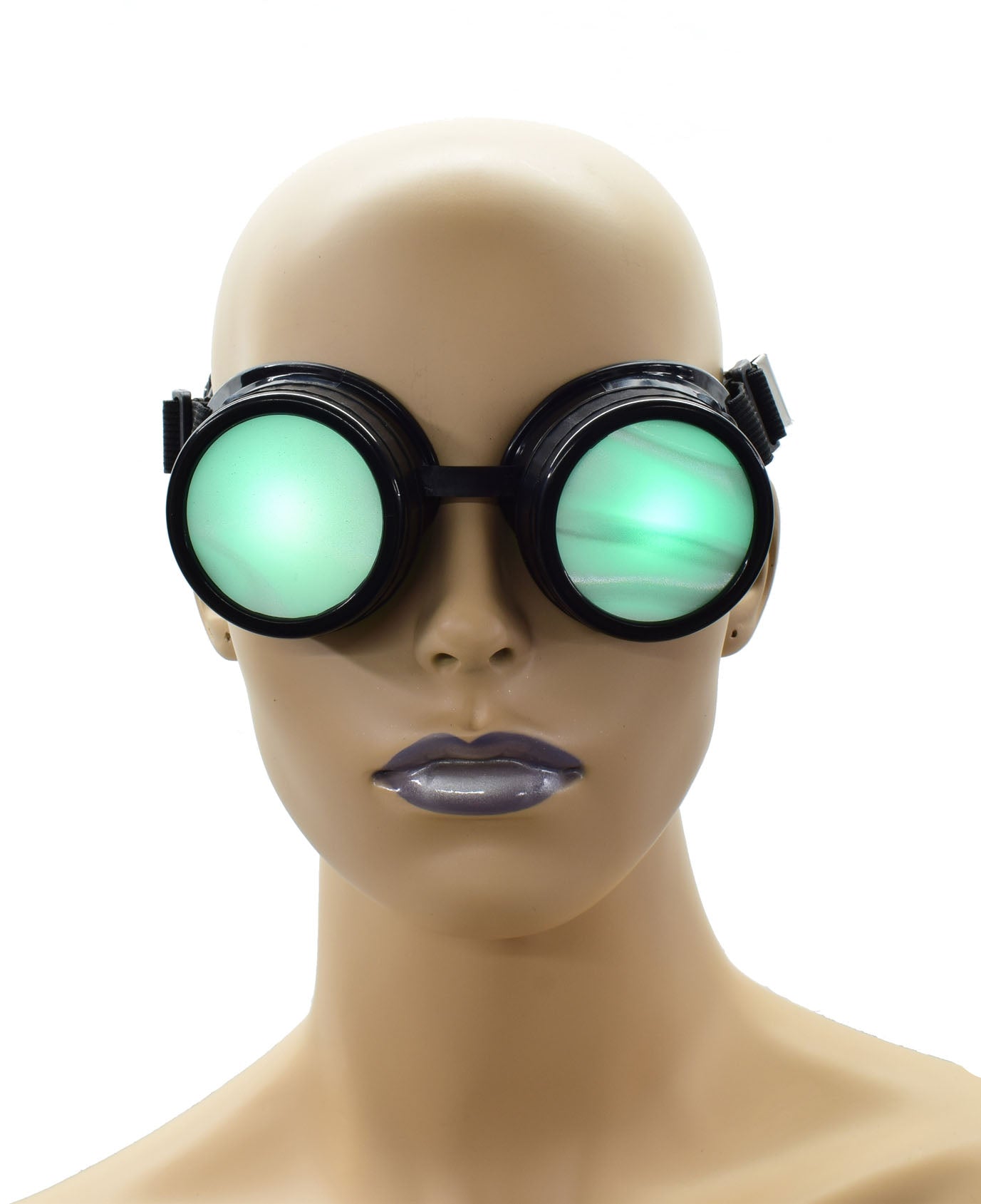 The Aurora Lights Blindfold on a mannequin head with green lights showing through the goggles, front view.