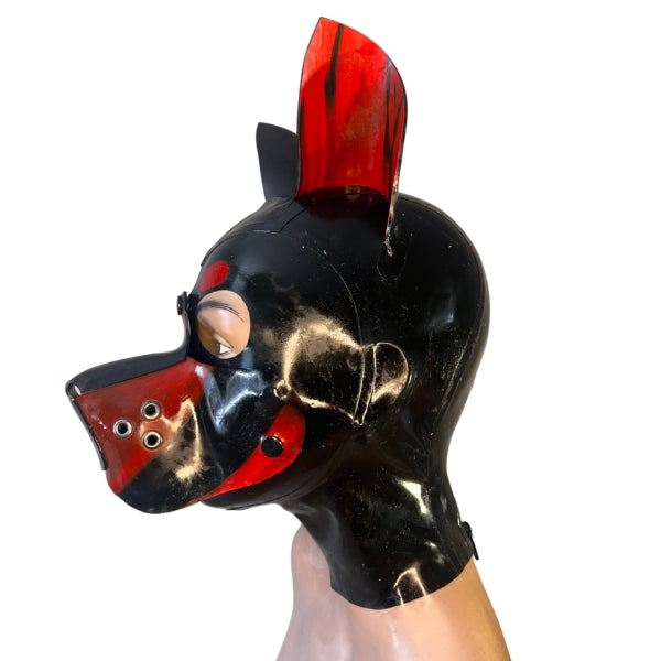 The left side view of the red and black marble Latex Doggy Hood with a round cheeks muzzle.