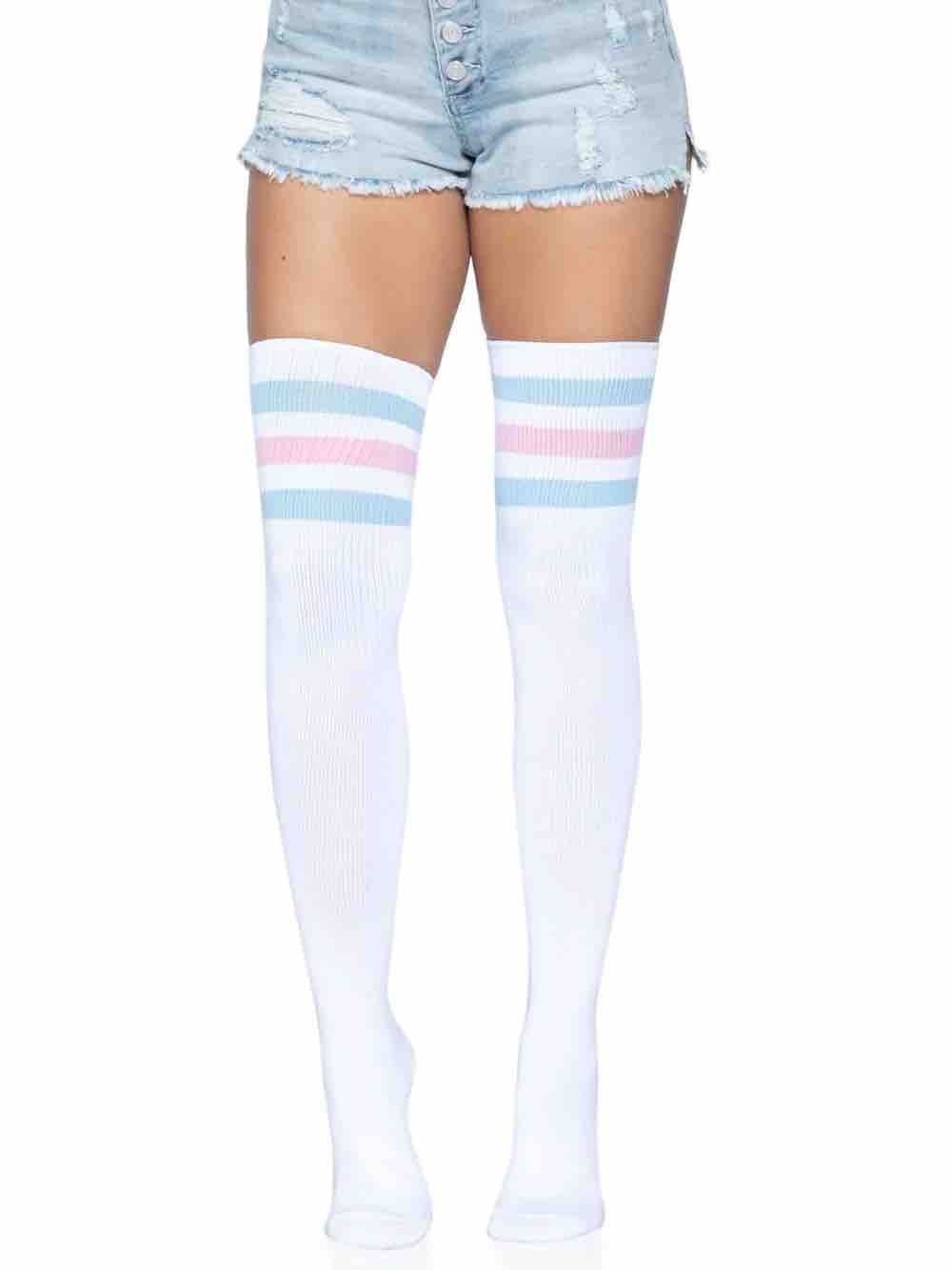 Model wearing the Trans Pride Over The Knee Athletic Socks with jean shorts.
