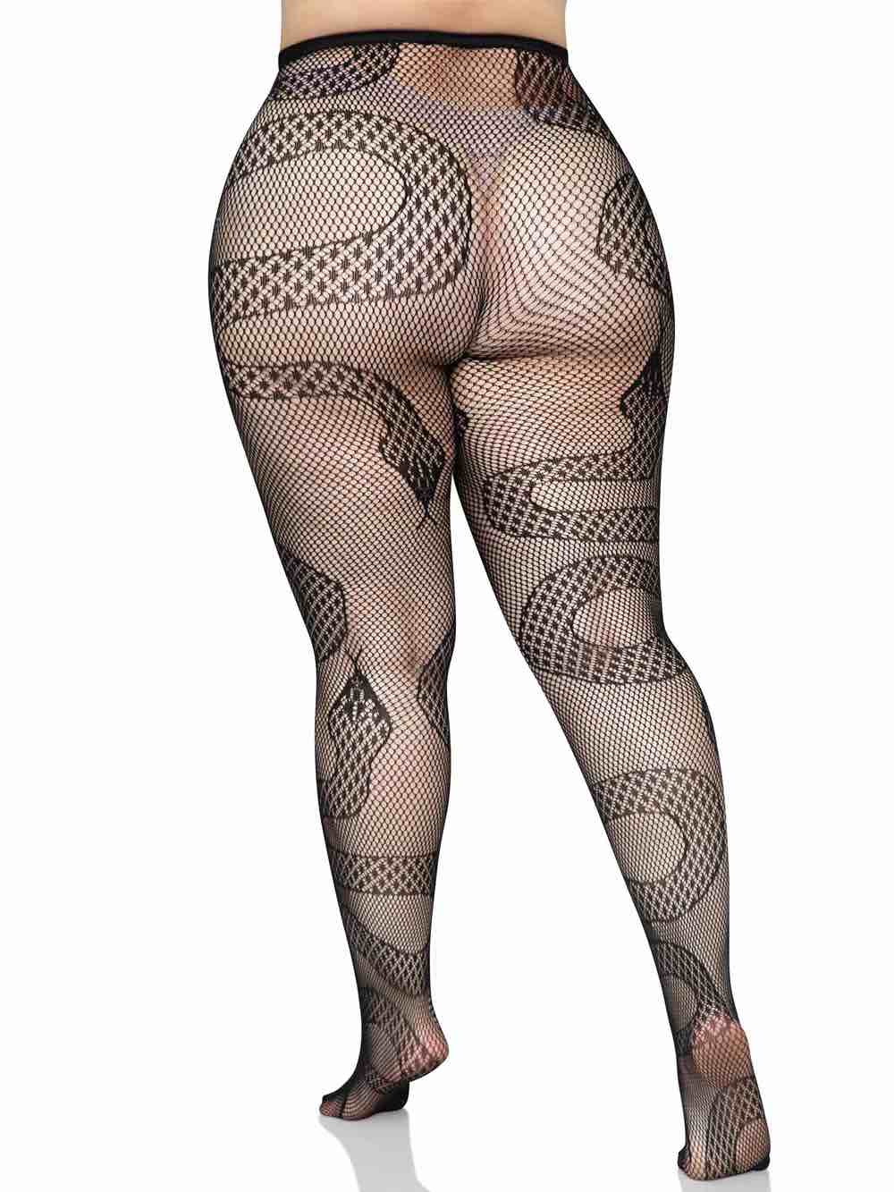 A plus size model wearing the Snake Net Tights over a nude thong, rear view.