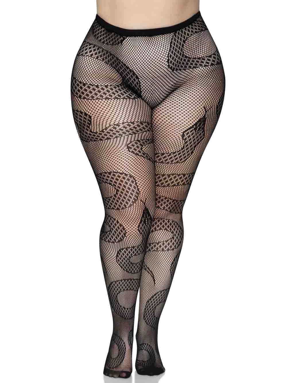 A plus size model wearing the Snake Net Tights over nude underwear, front view.