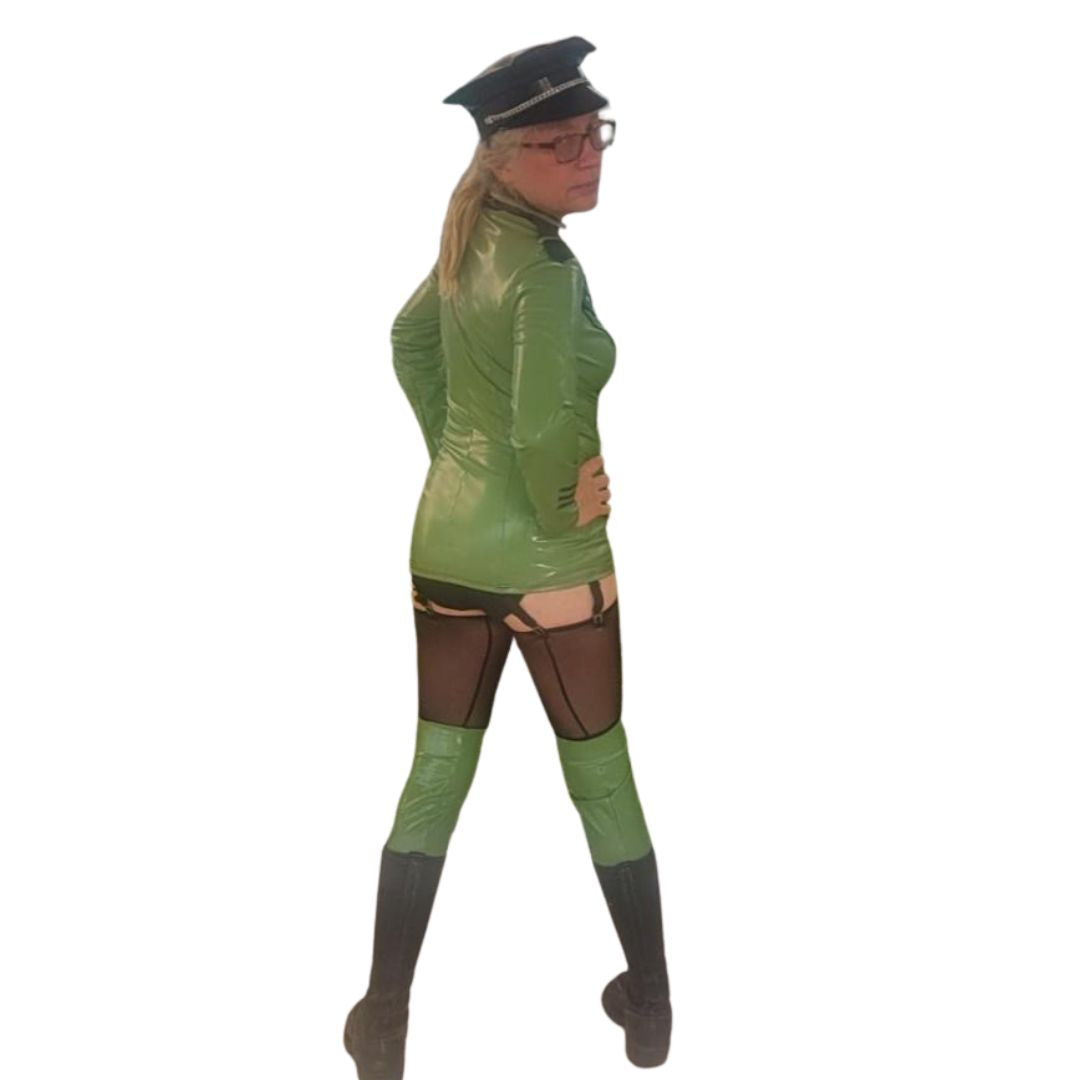 model wearing Green Datex Military Dress with stockings facing backwards 