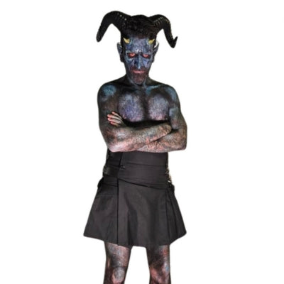 model wearing demon make up wearing black mini cargo kilt