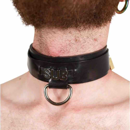 A model wearing the Heavy Rubber Customizable Word Snap Collar with the word SUB on the front.