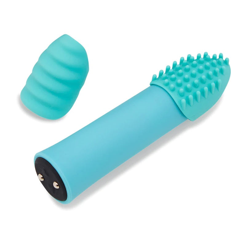 The The teal blue Sensuelle Point Plus Vibrator with extra attachment laying on its side.