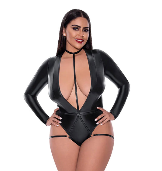 A plus size model wearing the Liquid Onyx Teddy with Harness Caging, front view.