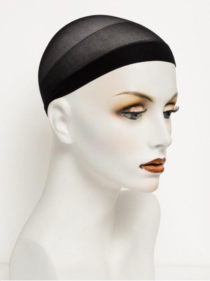 The black Wig Cap on a mannequin head.
