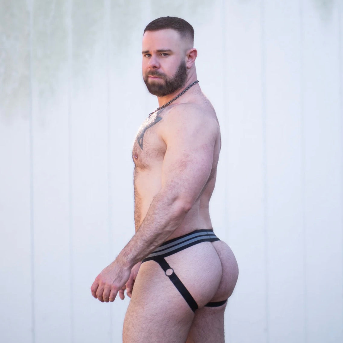 A model wearing the Gruff Pup Woof Air Jock with Bulge Boost, side view.