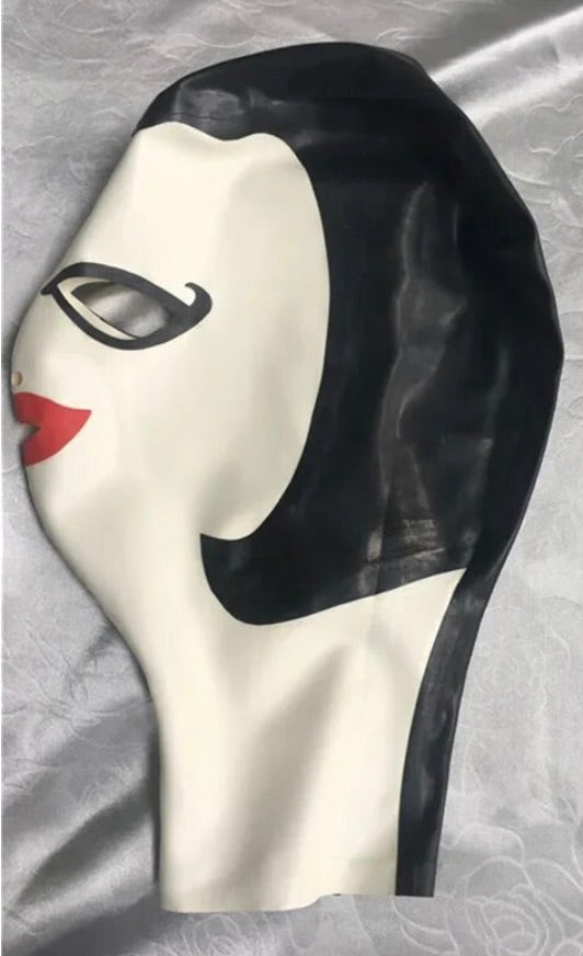The side view of the Latex Femme Hood Mask laying flat.