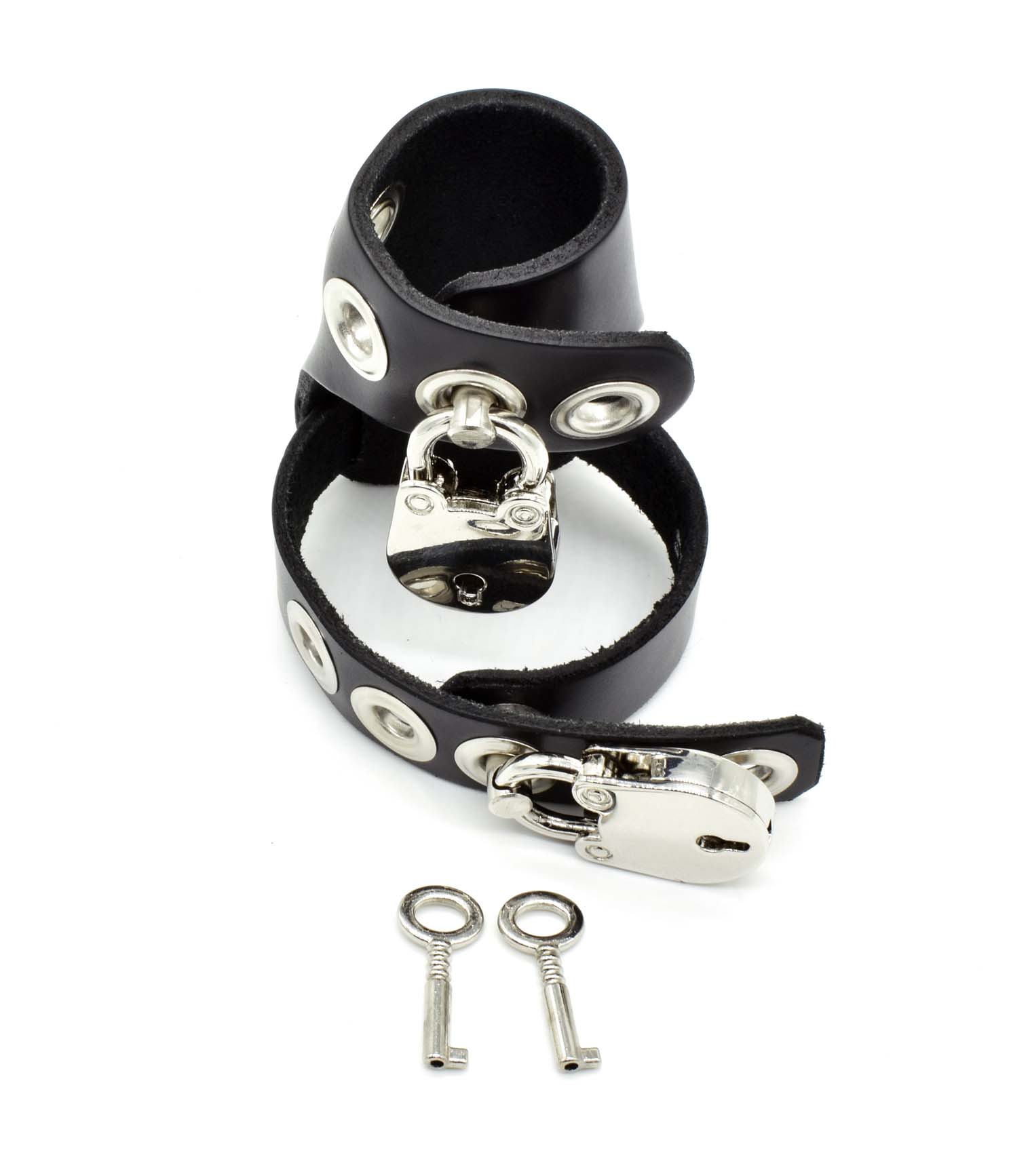 The Cock Lock Latigo Chastity Cage in the closed position with two locks and a set of two keys standing on its end, underside view.