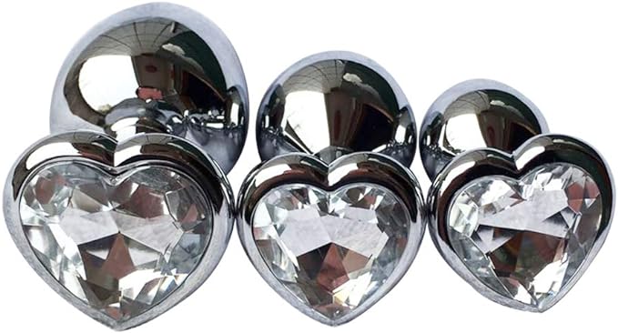 Three Steel Heart Jewel Anal Plugs of different sizes with clear heart jewels.