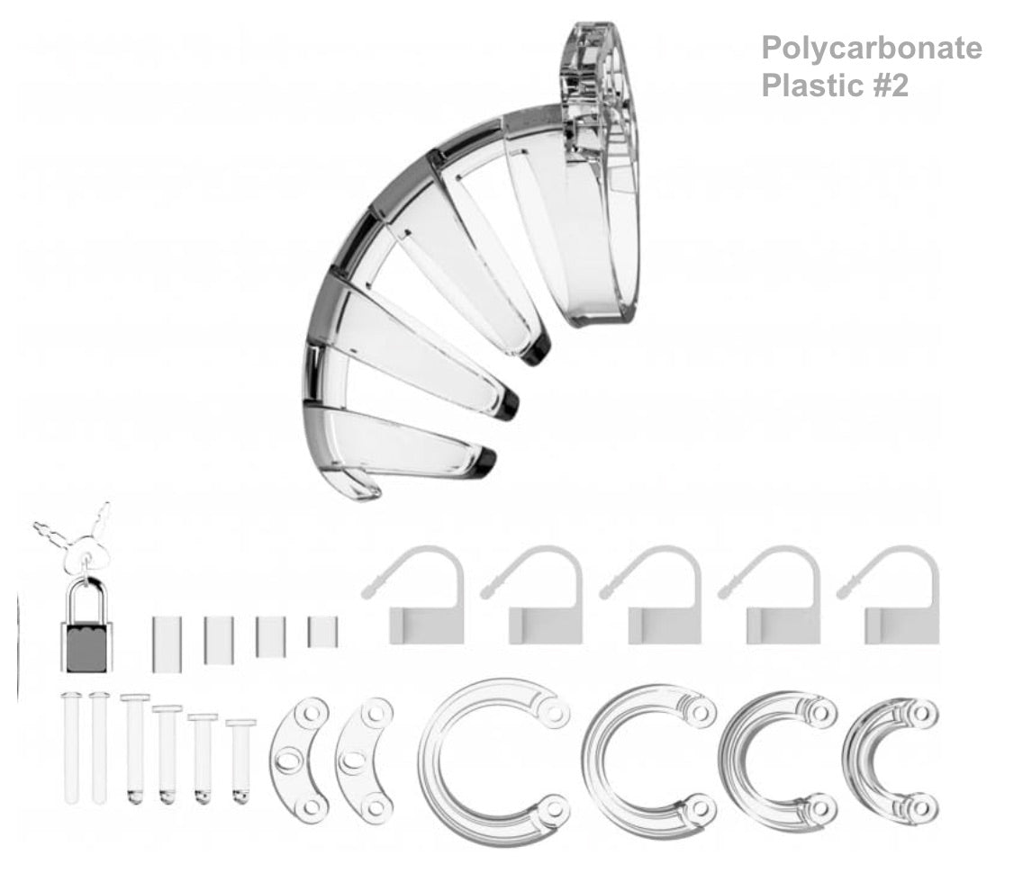 The clear polycarbonate plastic Mancage Chastity Device model #2 with all of its attachments.