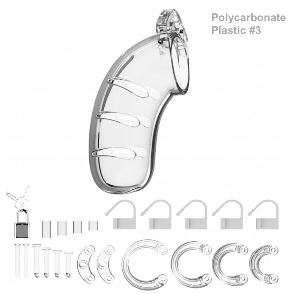 The clear polycarbonate plastic Mancage Chastity Device model #3 with all of its attachments.