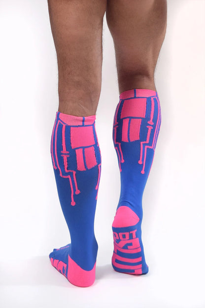 cybertech socks neon pink and blue on male model back view