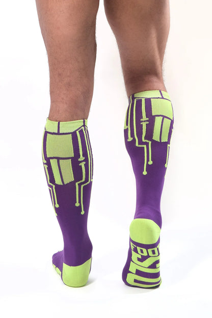 cybertech socks neon yellow and purple on male model back view