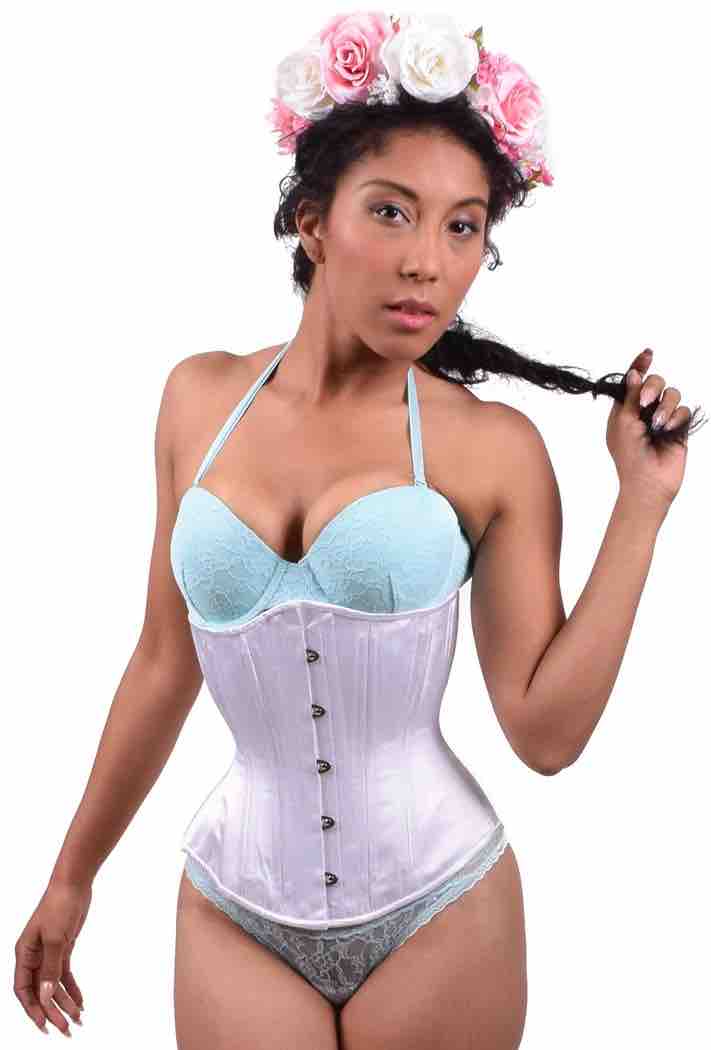 A model wearing the White Satin Mid-Length Underbust Corset - Hourglass over an aqua blue bra and panties.