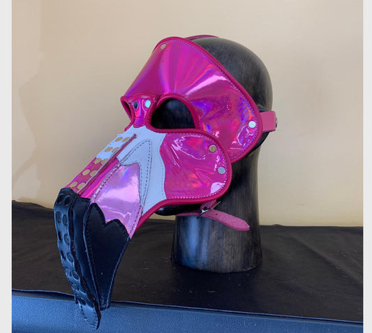 The Leather Flamingo Mask on a mannequin head, left side view.