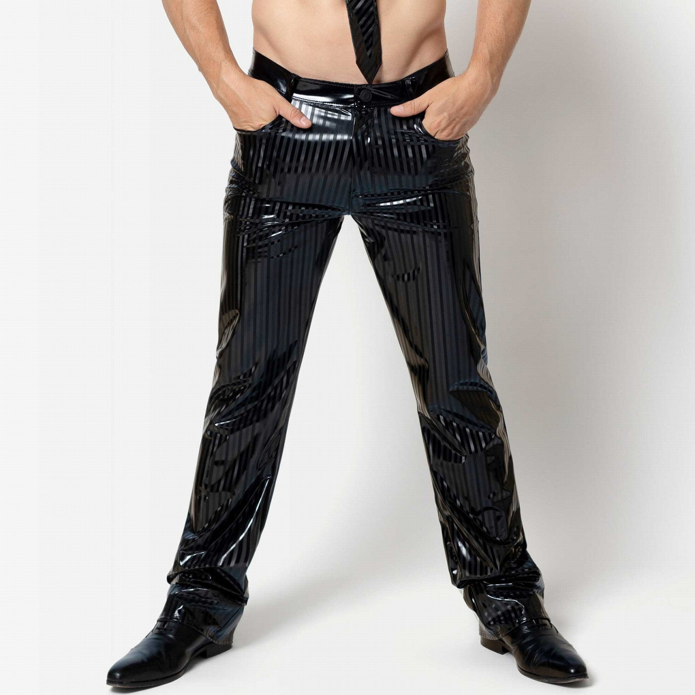 A model wearing the Magnus Pinstripe Patent Trousers, front view.
