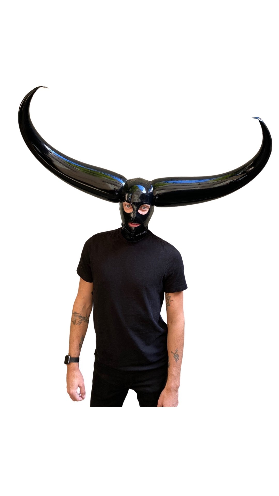 A model in a black tshirt and pants wearing the Inflatable Double Pony Tail Latex Hood, front view.