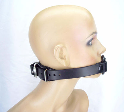 The comfort back O-ring gag on a mannequin head, side view.