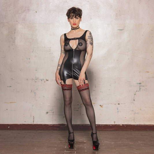 The Alba Wetlook & Mesh Romper Playsuit on model with fishnet thigh highs and platform heels, front view.