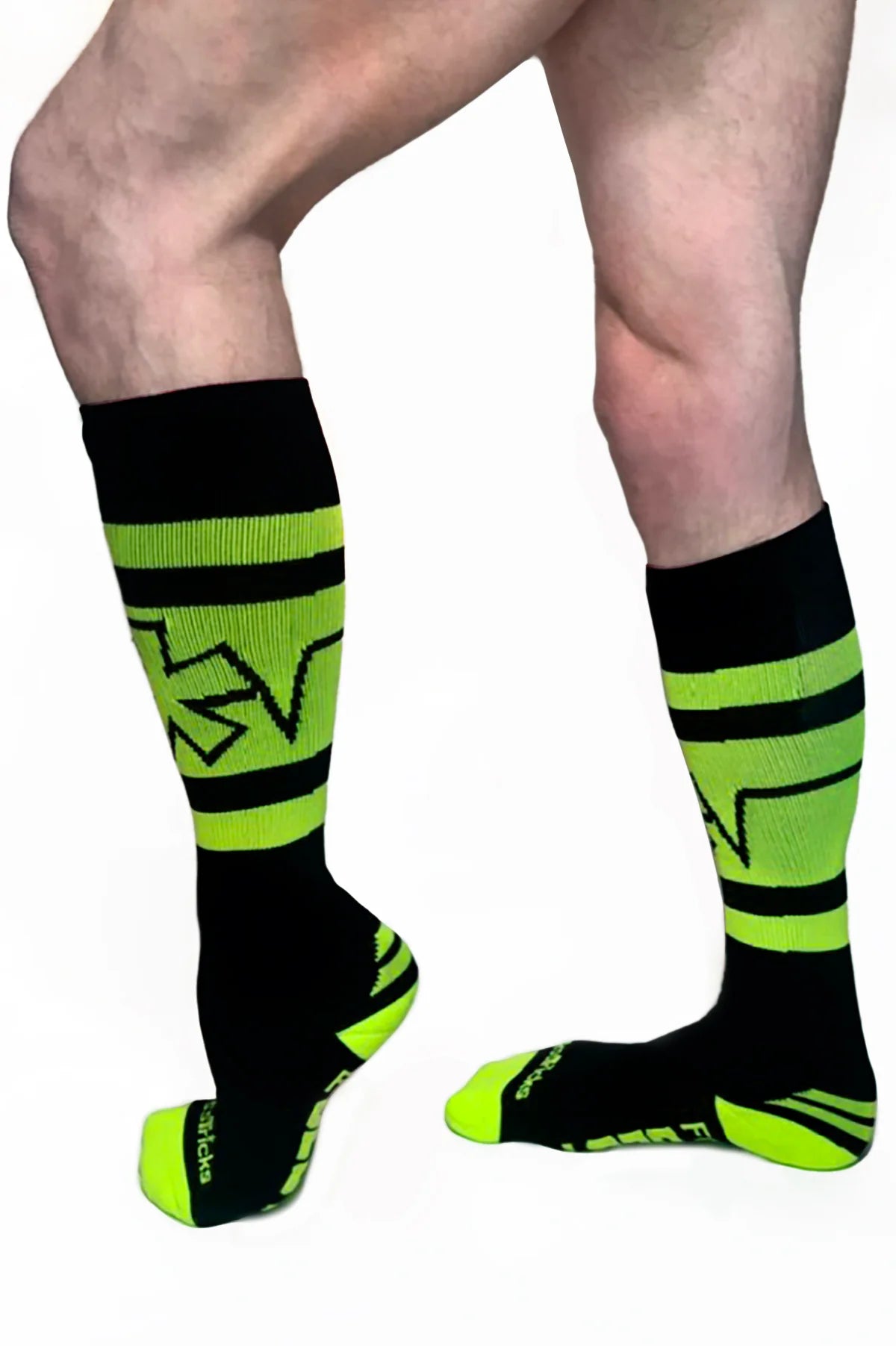 Pocket sock in neon green on male model side view