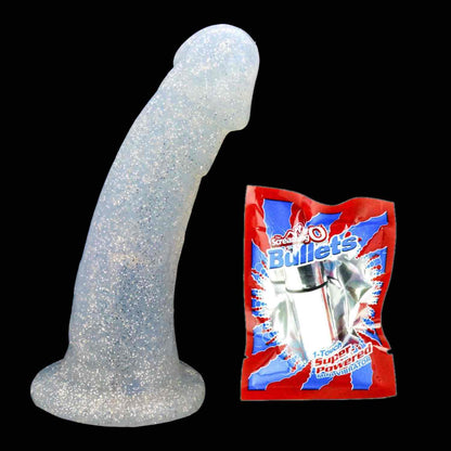 The silver glitter Woody Silicone Dildo next to a vibrating bullet in its packaging.