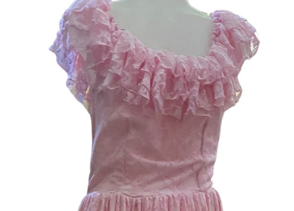 A close up of the ruffles on the pink Lace Wednesday Off Shoulder Dress.