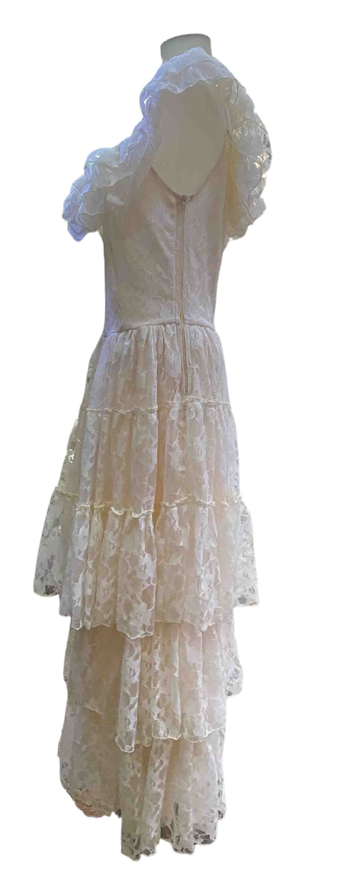 The cream Lace Wednesday Off Shoulder Dress, left side view.