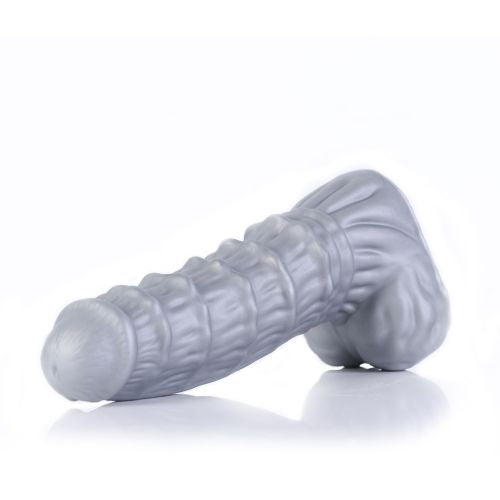 The Mr Ripley Liquid Silicone Dildo laying on its side.