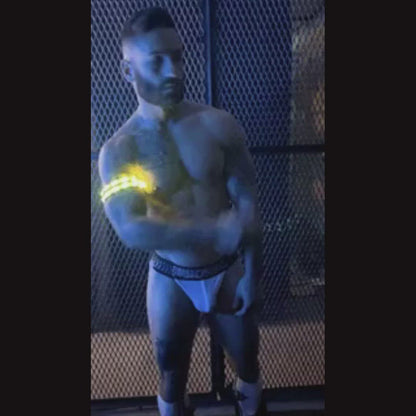A video of the Rave Armband lighting up on model's right arm.