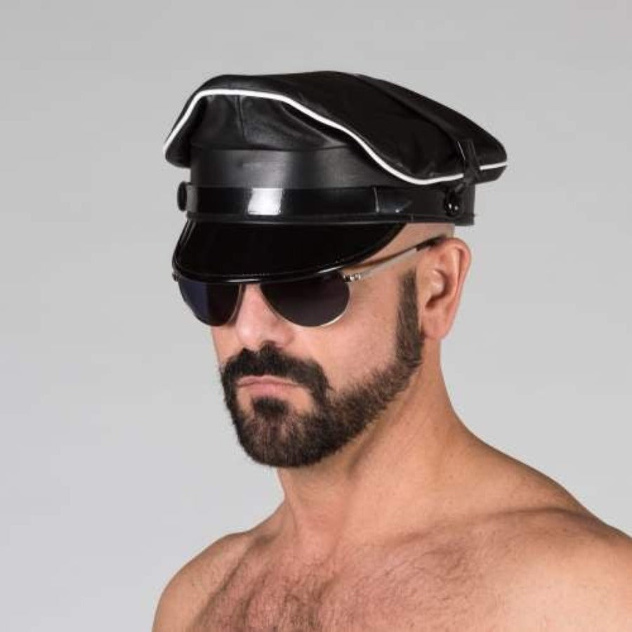 Front view of black/white prowler leather military cap.