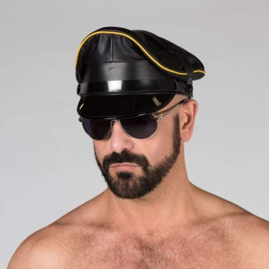 Front view of black/yellow prowler leather military cap.