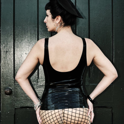 A model showing the back of the black Latex Tank Top.
