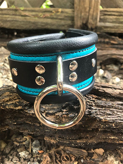 Teal rolled leather deluxe cuff with o-ring.