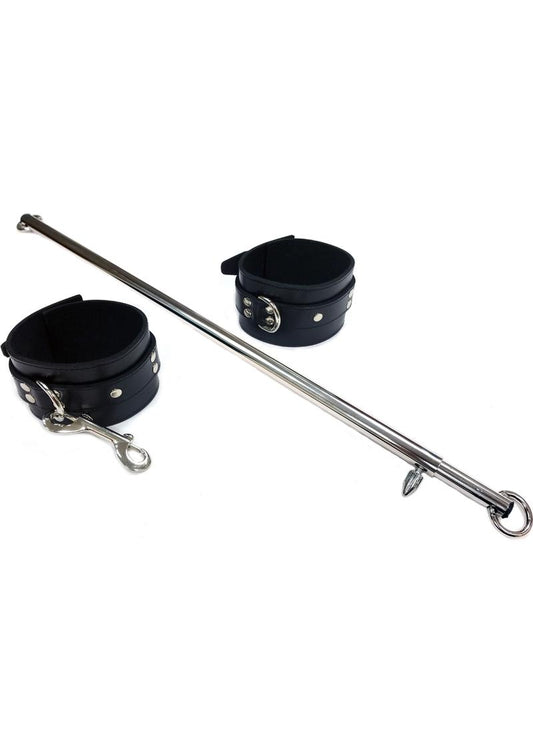 The Rouge Adjustable Leg Spreader Bar with buckled Leather Cuffs against a white surface.