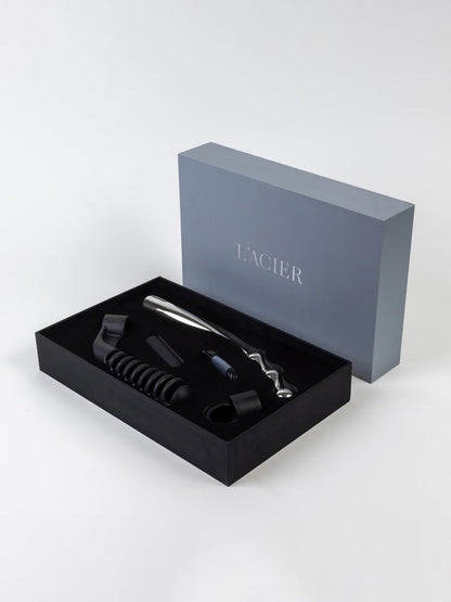 The Slide Stainless Steel Vibrating Dildo Set in its box.