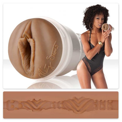 A composite of three photos; Misty Stone holding the Bump-n-Grind Fleshlight Girls, a closeup of the opening and a cross section of the inside of the toy.