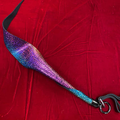 The outside of the Unicorn Holo Rainbow Suede Specialty Leather Whiplet Mini Dragontail.