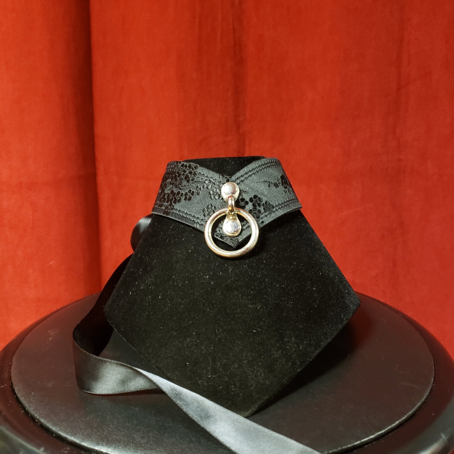 A black cherry Tie-Back Chevron Choker with O Ring.