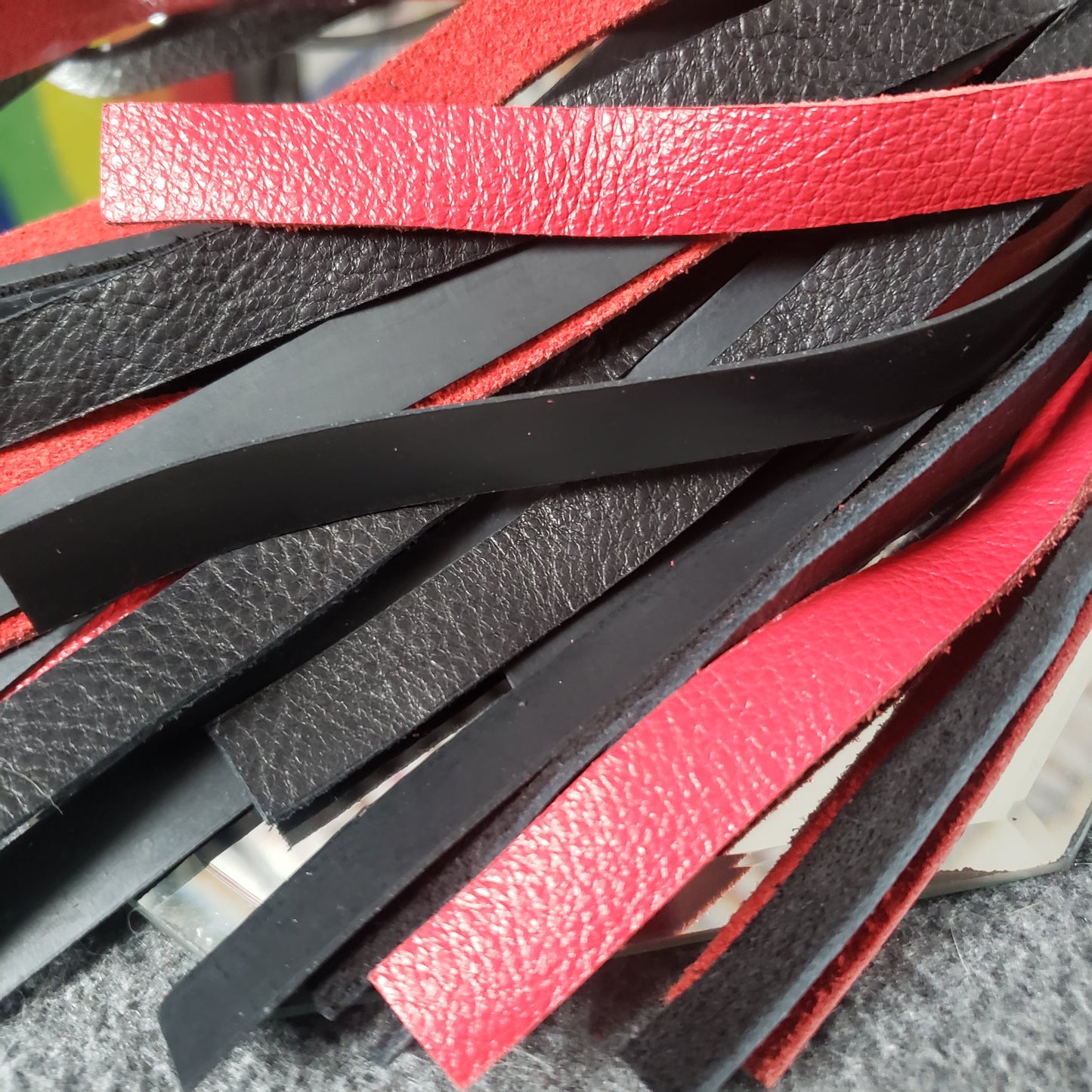 Combo sensation finger loop flogger leather rubber red black