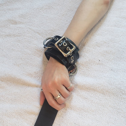 Wrist cuff on model's hand.