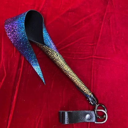 The inside of the The outside of the Unicorn Holo Rainbow Suede Specialty Leather Whiplet Mini Dragontail.