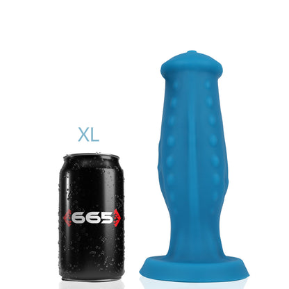 The extra large Jake Liquid Silicone Dildo next to a soda can for size comparison.