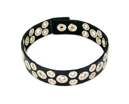 Black leather tentacle choker close up against white background
