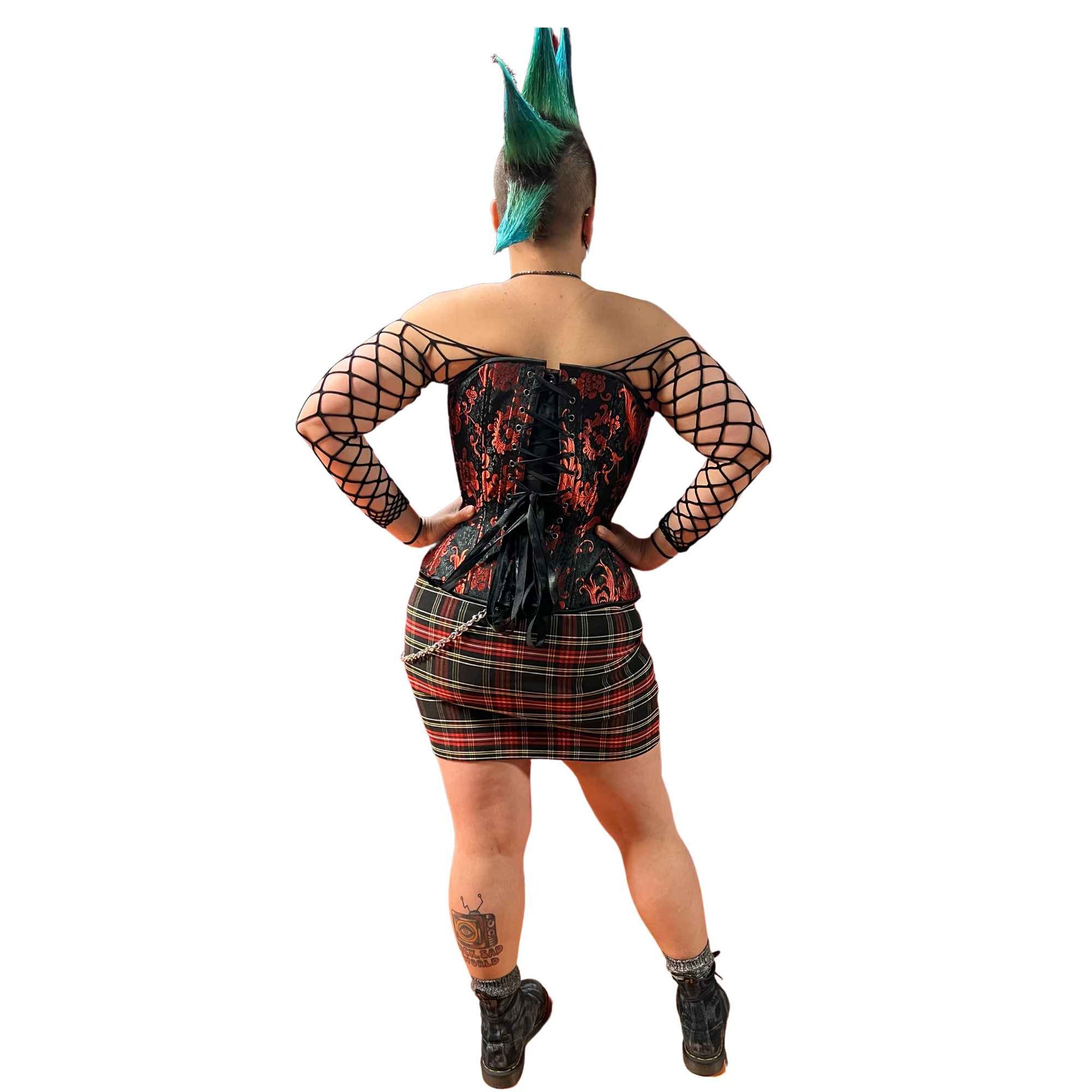 model wearing tartan tube skirt back view