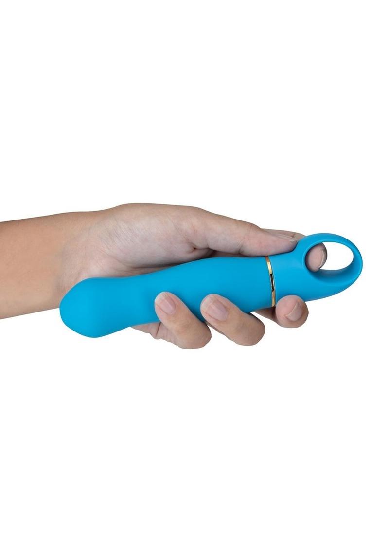 A hand holding the Aria Exciting AF Silicone Vibrator.
