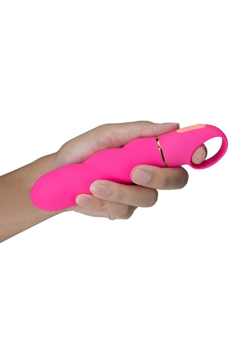 A hand holding the Aria Amazing AF Silicone Vibrator.